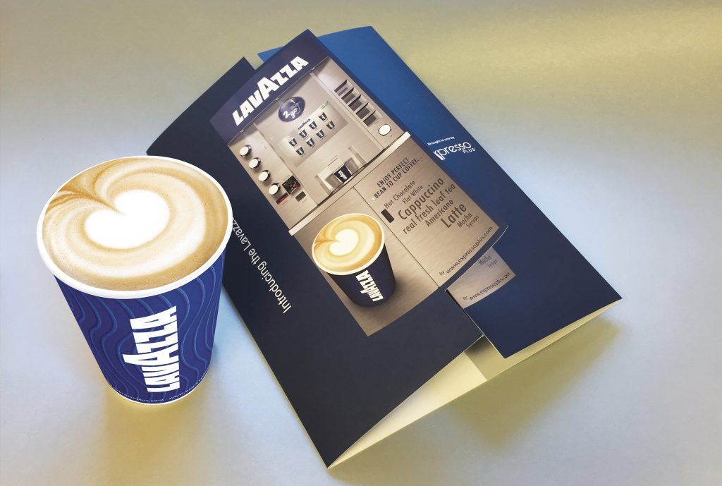 brochure and a coffee