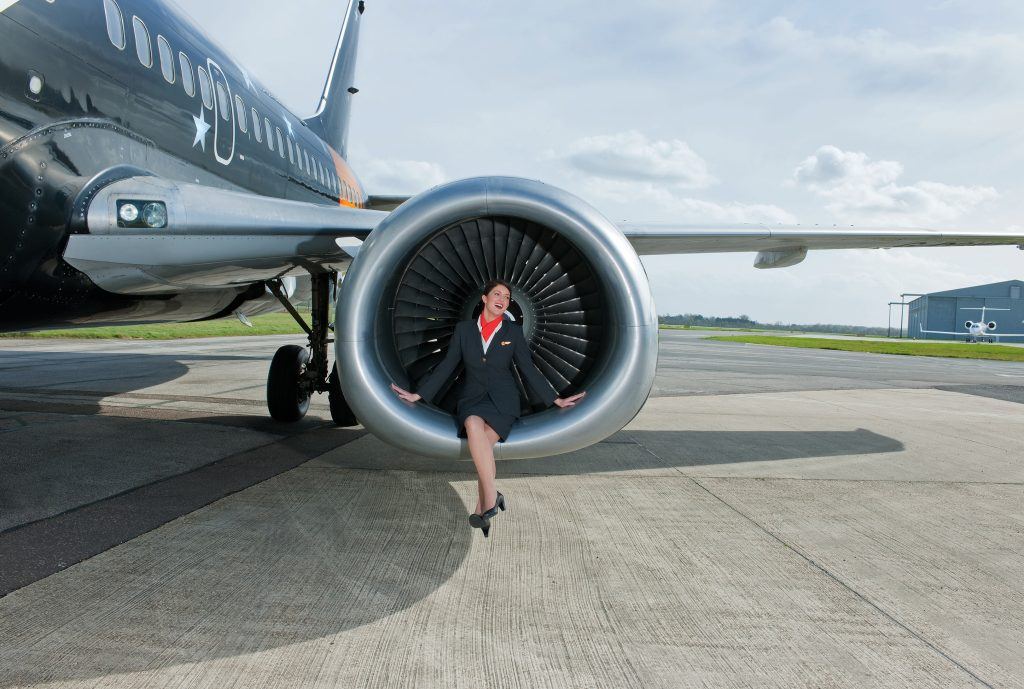 Woman sat in the engine of a plane